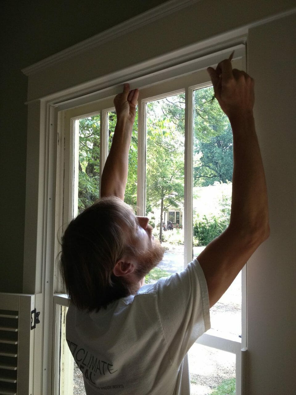 Klotz-Metal-Angle-Installation Climate Seal technician installing window inserts