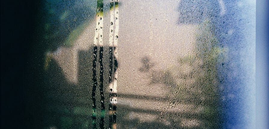 Condensation on a window featuring all-season Climate Seal window inserts.
